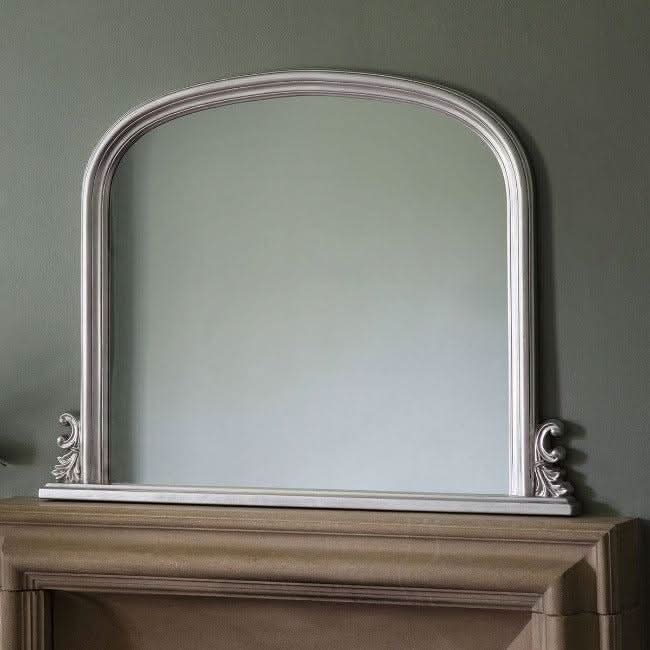 Elegant dome overmantle mirror in silver leaf finish, featuring bevelled glass design, dimensions 94 x 118cm.